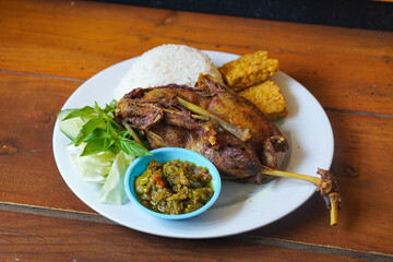 Duck Rice with Green Chili Sambal, Indonesia, captured on August 6, 2025. Steamed rice served with crispy fried duck and a spicy green chili sambal, a bold and flavorful Indonesian specialty