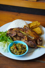 Duck Rice with Green Chili Sambal, Indonesia, captured on August 6, 2025. Steamed rice served with crispy fried duck and a spicy green chili sambal, a bold and flavorful Indonesian specialty