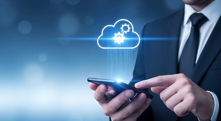Businessman using smartphone with cloud technology and gears