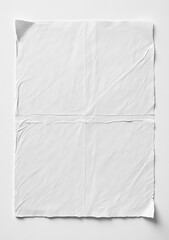 Obraz premium A crumpled, white rectangular sheet of paper, folded into four quadrants, rests on a plain white background; showing texture and creases