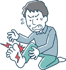 痛風で痛がる男性