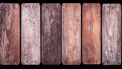 Six weathered, rectangular wooden planks arranged horizontally against a black background, showing variations in color and texture from dark brown to lighter, almost white, distressed areas