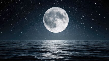 Full moon over a still ocean at night.