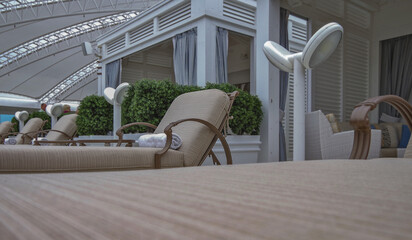 Outdoor private sun deck onboard modern luxury cruiseship cruise ship liner with elegant sun...