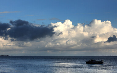 Diamond Harbour, West Bengal, India. July 2023. A boat sailing through the Hooghly River near Diamond Harbour, West Bengal, India.