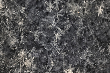 snow snowflake texture dark background, snow surface in winter, winter photography