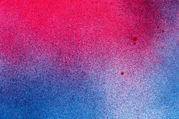 赤色と青色のスプレー塗料で塗った背景	