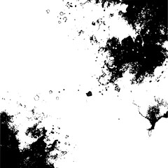 Black and white image showing a splattered ink effect with various sizes and shapes scattered around the page