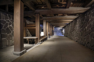 March 24 2025 Stone Hallway with Wooden Beams in a Traditional Setting, Japan © boying