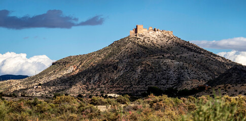 Castle on a Hill Under Partly Cloudy Sky in Almeria