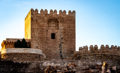 Historic Stone Castle with Tower Against Blue Sky in Almeria