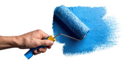 Hand holding a paint roller applying blue paint on a wall.