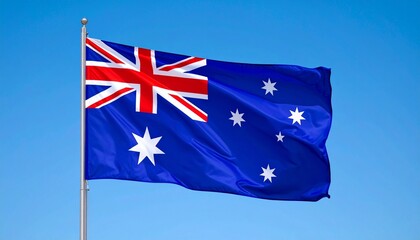 Australian Flag with Union Jack, Commonwealth Star, and Southern Cross Flying Against Clear Sky