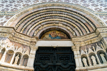 Obraz premium Ornate Architectural Entrance with Intricate Carvings, in l'Aquila, Abruzzo, Italy