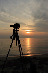 Sunrise with DLSR camera and tripod