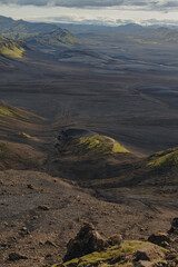 Rugged Volcanic Landscape with Green Moss in Iceland