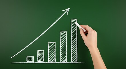 Chalkboard graph displays growth with hand drawing bar chart