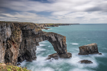 The Green Bridge of Wales. A famous geological landmark on the rugged coast of Pembrokeshire,...