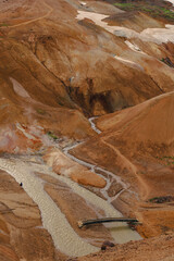 Geothermal Hills with Steam Vents and River in Iceland