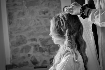 Bride getting her hair done