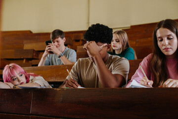 Students in a Classroom Showing Mixed Emotions During a Lecture or Study Session
