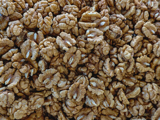 Shelled Walnuts Close-Up Texture Background
