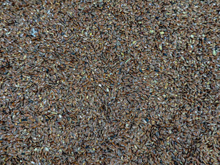 Brown Flax Seeds Close-Up Background