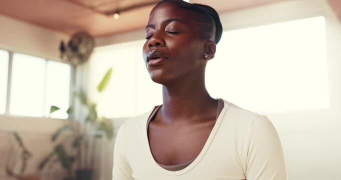 Breathing, relax and yoga with black woman in studio for awareness, balance or inner peace. Holistic exercise, meditation and mindfulness with yogi person in fitness class for health, wellness or zen