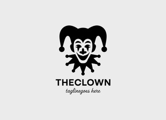 This logo portrays a whimsical clown face with playful elements, embodying joy, entertainment, and fun in a friendly and charismatic design.