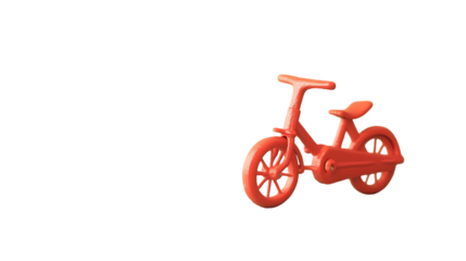 Close up of a red toy bicycle against a plain black background on transparent background