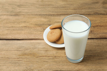 Fresh milk with cookies on the table