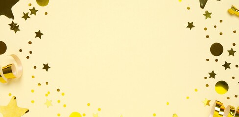 Golden confetti on pastel beige background. Ideal for Christmas, birthdays and other holidays. Top view, space for text