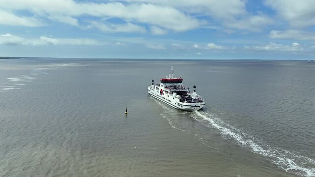 Aerial video from the ferry from Holwerd to Ameland on the Wadden Sea in the Netherlands