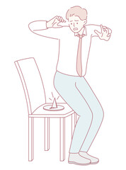 A startled man reacts in a very dramatic way to an unexpected and surprising event involving a chair