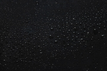 waterdrops on black iron background