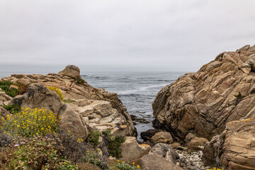  Granodiorite of Monterey(Cretaceous). Point Joe Vista Point. 17-Mile Drive is a scenic road through Pebble Beach and Pacific Grove on the Monterey Peninsula in California.	
