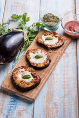 eggplants mini pizzas with mozzarella and tomatoes