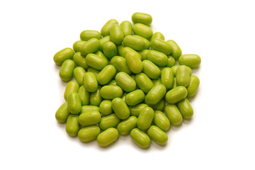 Sweet multicolored candies isolated on white background.