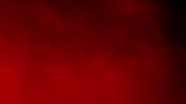 Red mist and blood swirls and flows slowly on a black background. Ideal overlay for bloody horror films, dramatic intros, atmosphere of danger or passion