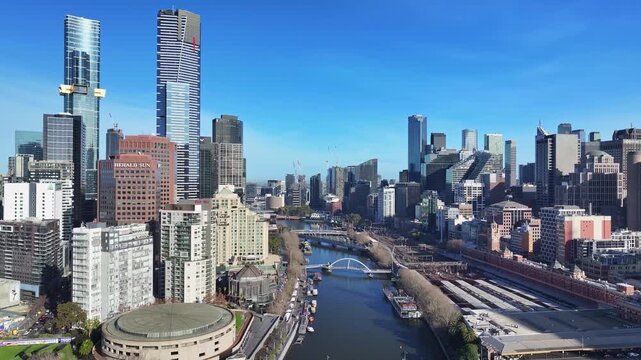 Central Melbourne skyline with trams crossing Princes Bridge above the Yarra River