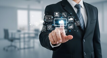 A businessman in a suit interacts with a digital cloud interface, surrounded by floating application icons, in a modern office setting.