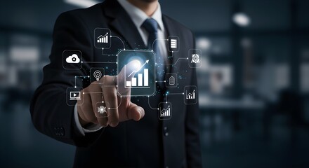 Businessman in suit touching a digital interface displaying financial charts and data analytics, symbolizing business growth and technological advancement.