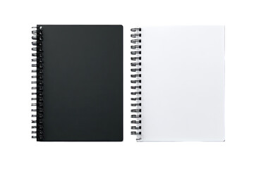 Two spiral-bound notebooks, one black, one white, lie open.  Blank pages are visible.  Both feature a similar, simple design