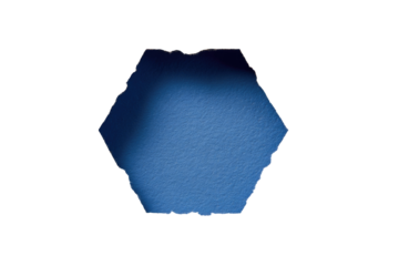 Hexagonal, deep blue shape, slightly irregular edges, dark background