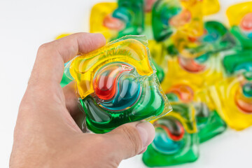 Capsule for washing in the washing machine