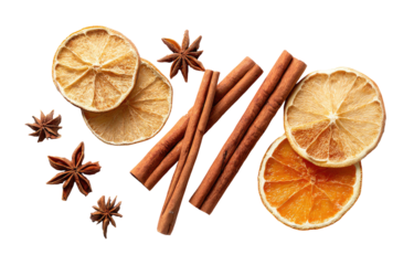 Dried orange slices, cinnamon sticks, and star anise, arranged on a black background