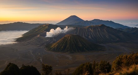 Obraz premium Sunrise over volcanic caldera, Indonesia, misty mountains