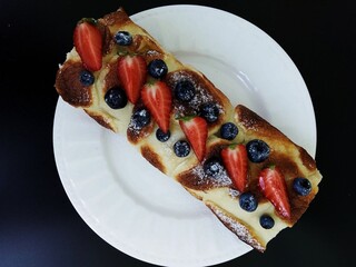 Cake roll with berryes. Homemade dessert.