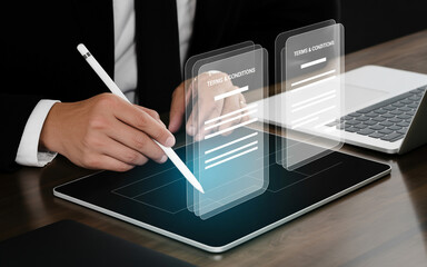 Person using white stylus on tablet with glowing holographic terms and conditions digital signature