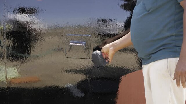 Painting a Masterpiece - Hand at Work with Brush in Motion